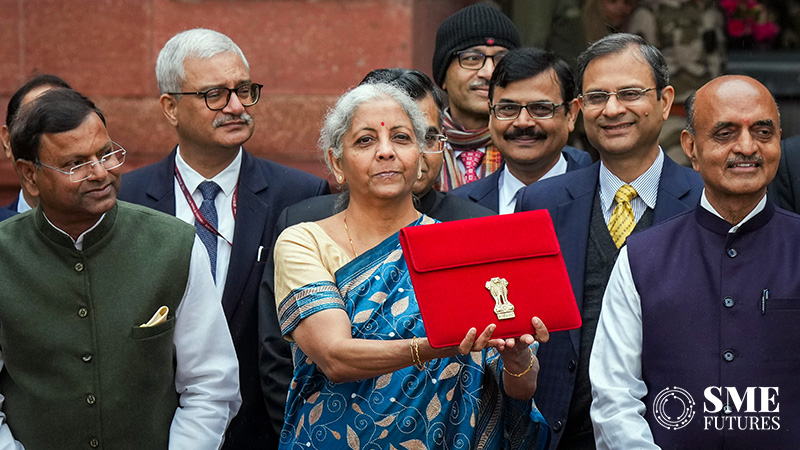 Sitharaman takes tablet in red pouch paperless budget